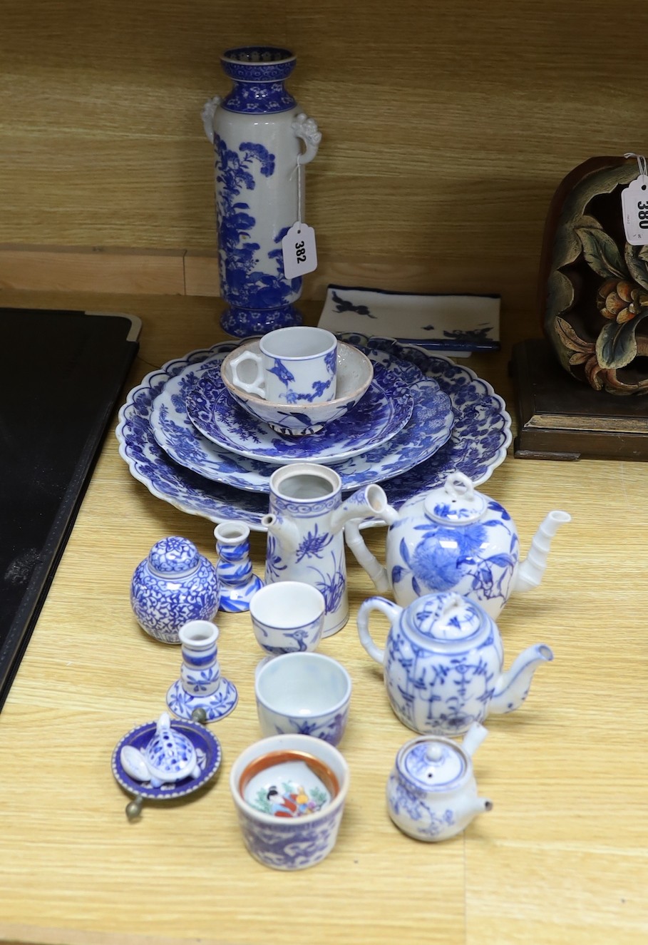 A collection of mostly Japanese blue and white ceramics, late 19th/early 20th century, including a Seto two handle vase, 27 cm high
